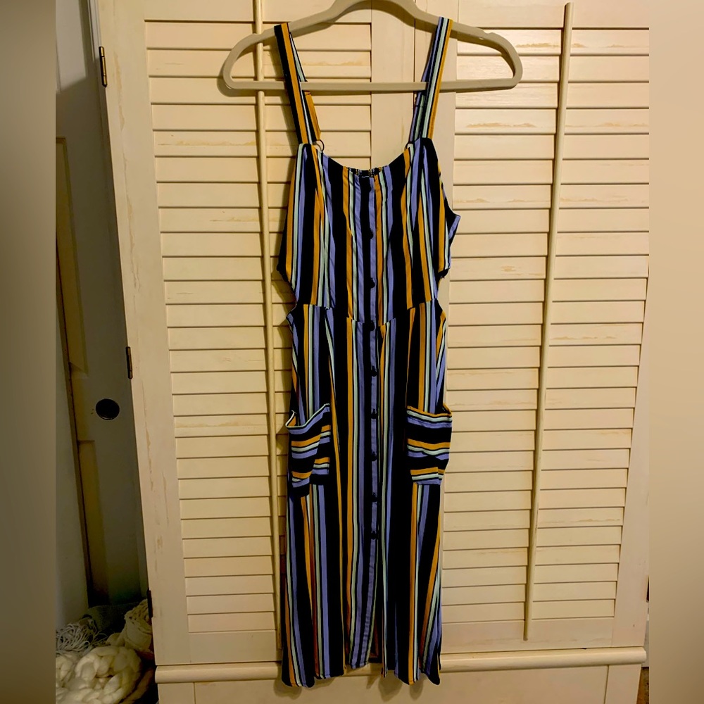 Navy blue and yellow striped button down dress with cut outs at waist